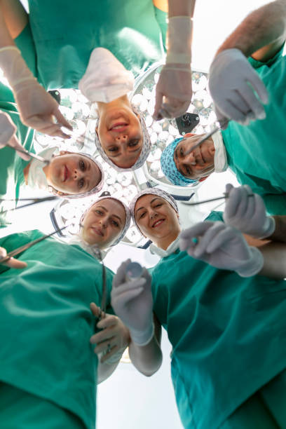 istock Team of nurses and surgeons in surgery. 1664286856