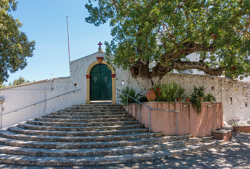 The gate of the Holy Trinity monastery in Klimatia village, Corfu, Greece