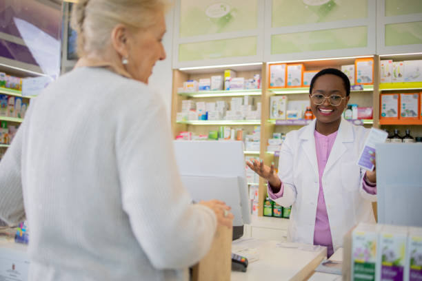 istock Senior woman inquires about medicines 1664402105