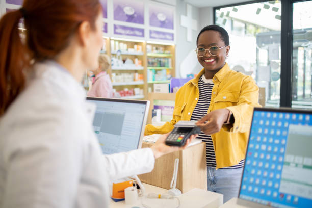 istock Satisfied customer at the pharmacy 1664402614
