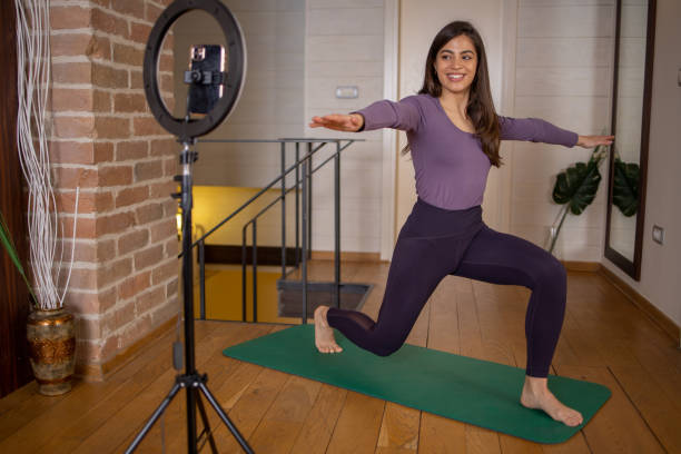istock Woman is recording a vlog about exercise 1664404807