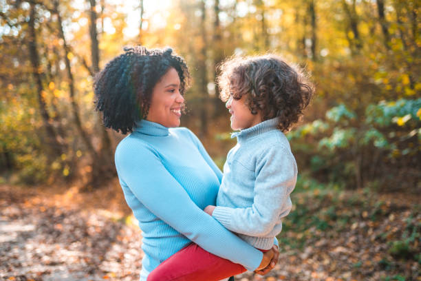 istock Caring Mixed Race Mother And Son Loving And Bonding On An Outdoors Day 1664439477