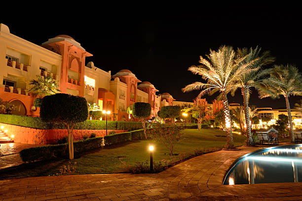 istock Swimming pool at luxury hotel in night illumination 166444053