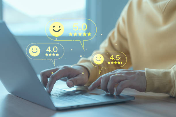 istock Male customer using a computer laptop in give rating to service experience assessment on application to the shops. Online customer review satisfaction feedback survey and testimonial. 1664457230