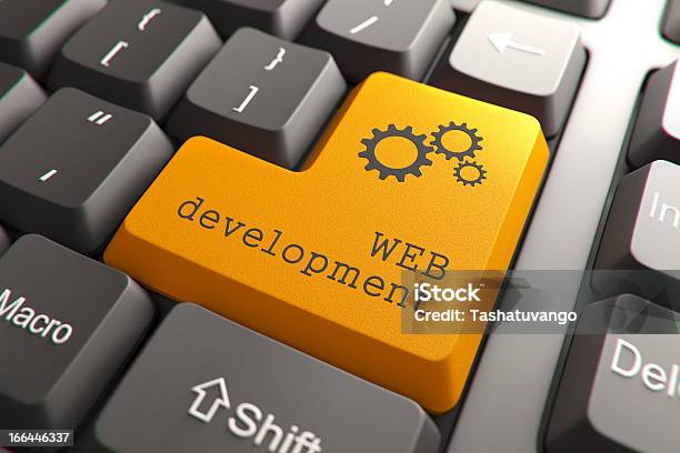 Keyboard With Web Development Button Stock Photo - Download Image Now - Business, Coding, Computer