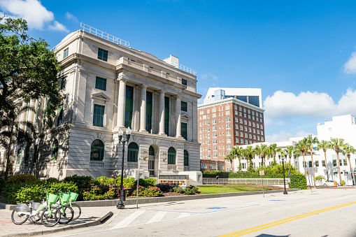 In Orlando, United States the historic courthouse downtown has columns marking the entrance of the building.