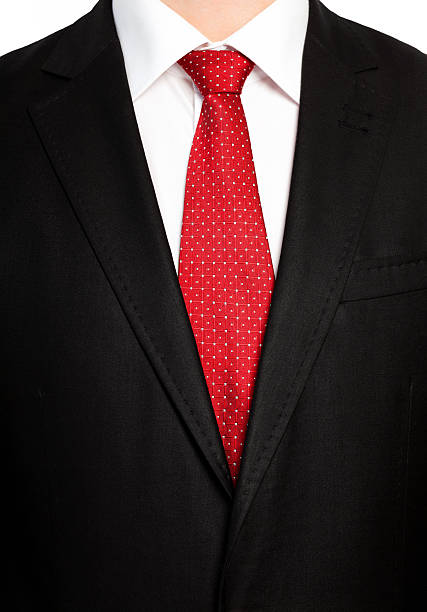 istock businessman in black suit with a red tie 166446679