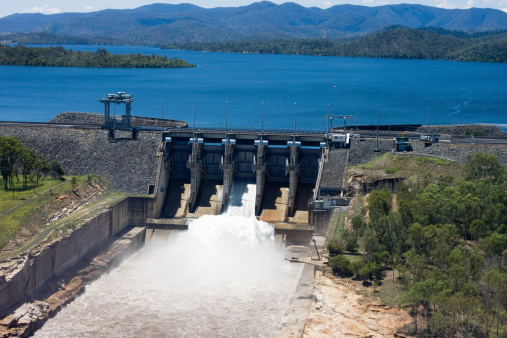 Aerial image of Wivenhoe Dam near Brisbane in Queensland Australia releasing water from the spillway.