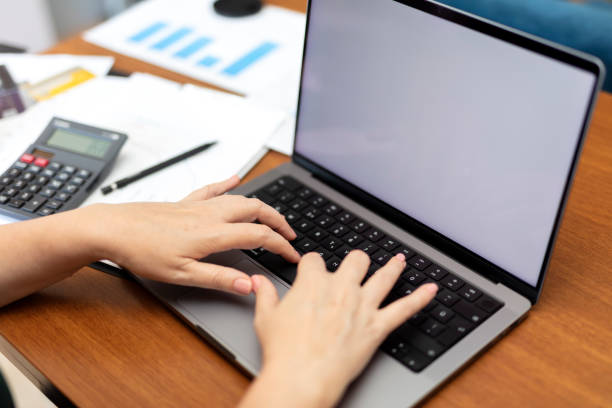 istock view of young woman doing paperwork manage financial documents 1664539415