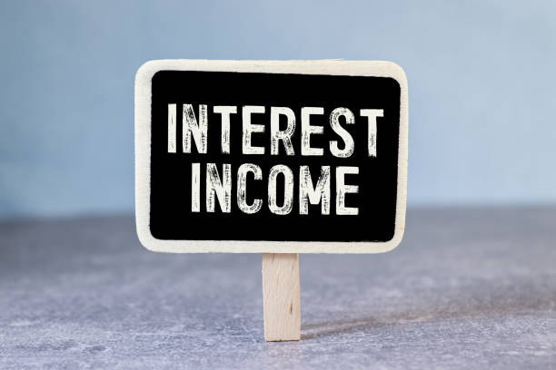 istock Interest Income on a black plaque. Concept business 1664550068