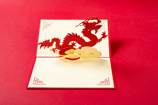 a pop-up greeting card with a dragon