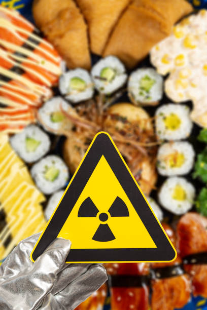 istock nuclear radiation warning sign above blurred sushi vertical composition 1664597311