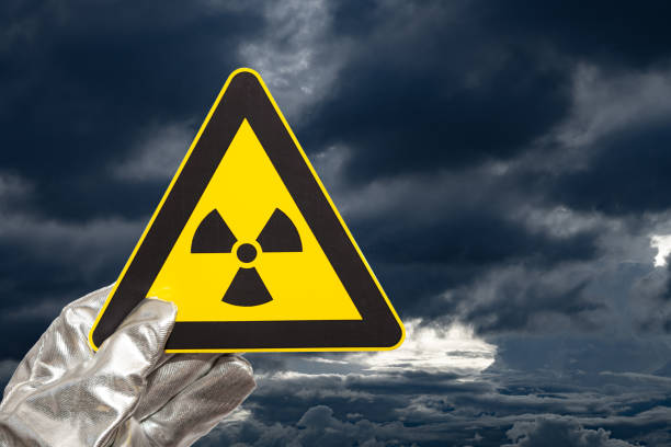 istock nuclear radiation warning sign with dark and heavy clouds 1664598336