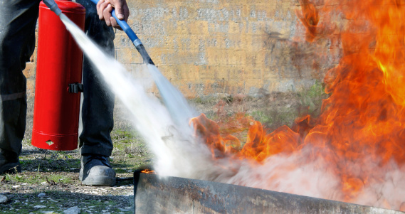 Fire Extinguishing with powder type fire extinguisher