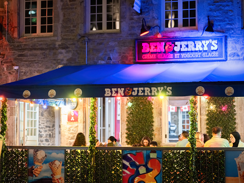 Montreal, Quebec, Canada - July 29, 2023: Ben & Jerry's Ice Cream shop in the popular 'Place Jacques Cartier' of the Historic District of Old Montreal.