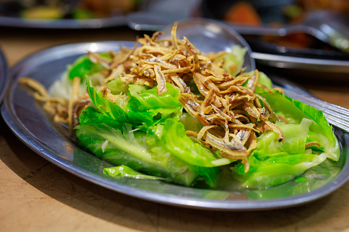 Shredded lettuce in a bowl