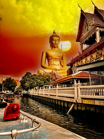 Big Buddha image during sunset in Bangkok