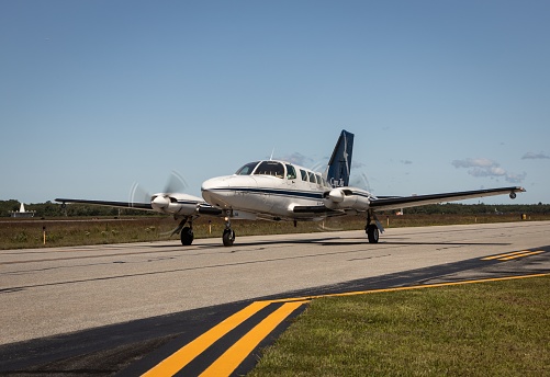 West Tisbury, United States – September 01, 2023: A Cape Airways airplane taxiing on the runway at Martha's Vineyard Airport in West Tisbury