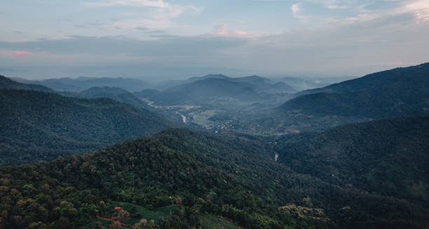 istock Mountain view from hill country village 1664874742