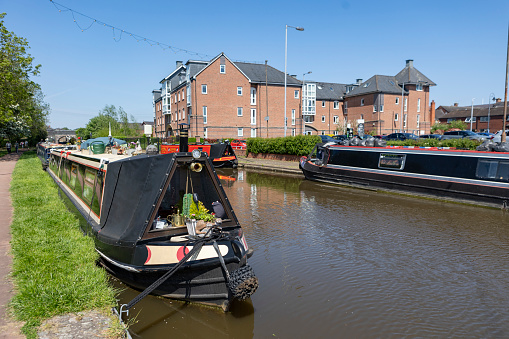 Stone Staffordshire, uk, may 20 2023  A waterside view of narrowboats in  Stone, as seen from the narrowboat