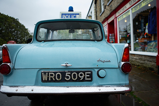 Dudley, west midlands united kingdom 15 November 2021 close up of rear of Vintage blue and white Ford Anglia car, used as a police car