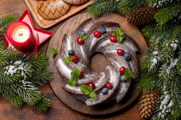 istock Christmas cake with blueberries, cranberries and mint 1664924901