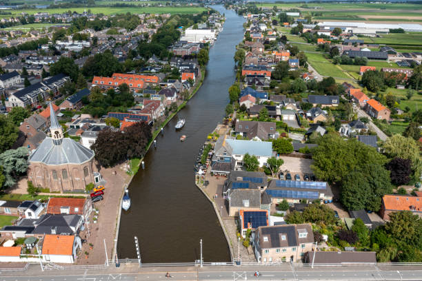istock Typical Dutch village; Woubrugge. 1664932257