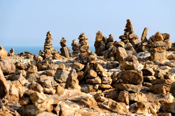Stone stacking at Fa Shan, Hong Kong Unesco Global Geopark coast, Sai Kung East country park, Hong Kong.