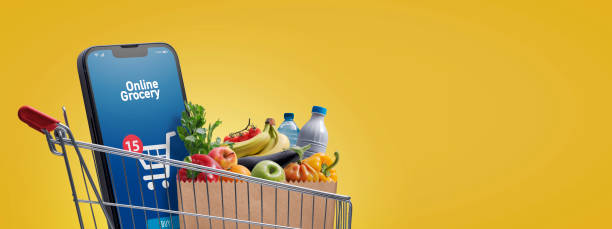 istock Full shopping cart and smartphone 1664991498
