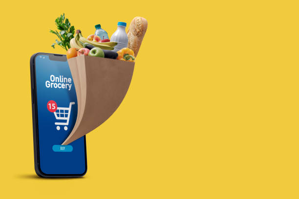 istock Online grocery shopping app and grocery bag 1665007218