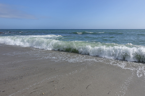 Coastline  Beach Sea waves  Horizon line above the water  Summer season  Bretagne Finistère France