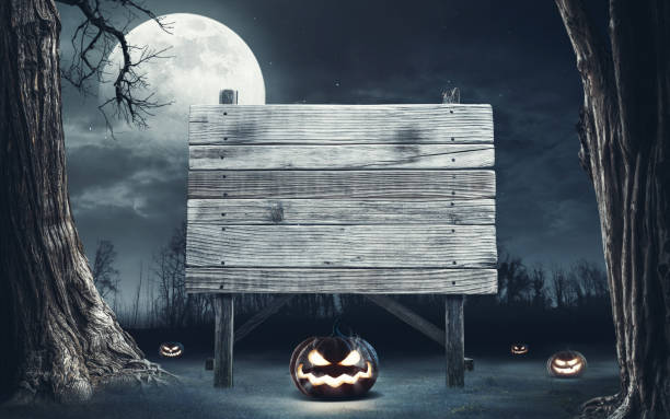 istock Halloween wooden sign in the forest 1665044279