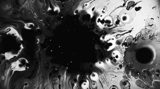 istock Ink surface wet swirls dark fluid spreading oil 1665077876