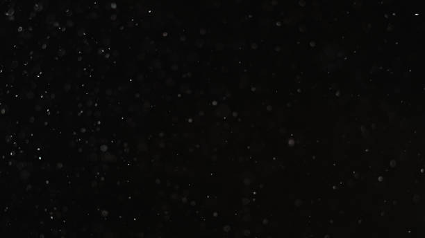 istock Snow background grain texture overlay blur flakes 1665077890