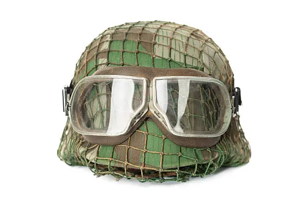 Photo of camouflaged helmet with protective goggles