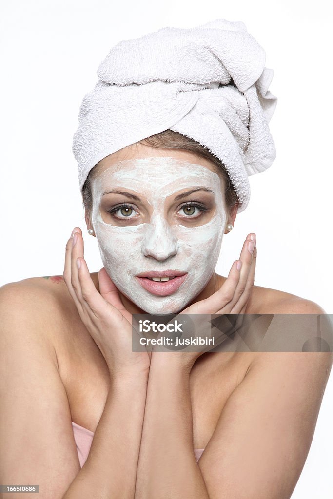 woman with a beauty mask woman with a beauty mask and towel Make-Up Stock Photo