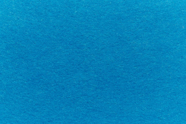 istock Soft felt textile material Blue colors, colorful texture flap fabric background closeup 1665107473