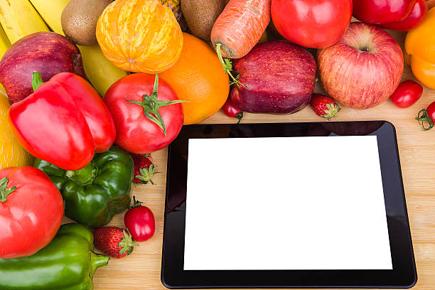 istock fruits Vegetables variety and digital tablet 166510802