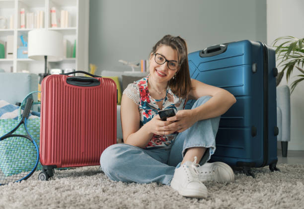 istock Happy tourist at home ready to leave 1665116463