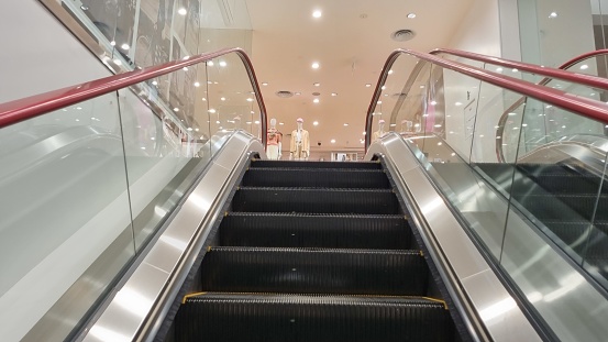 Escalator in department store