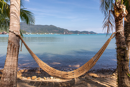 Straw hammock, Bang Bao Beach, Koh Chang Island, Thailand.