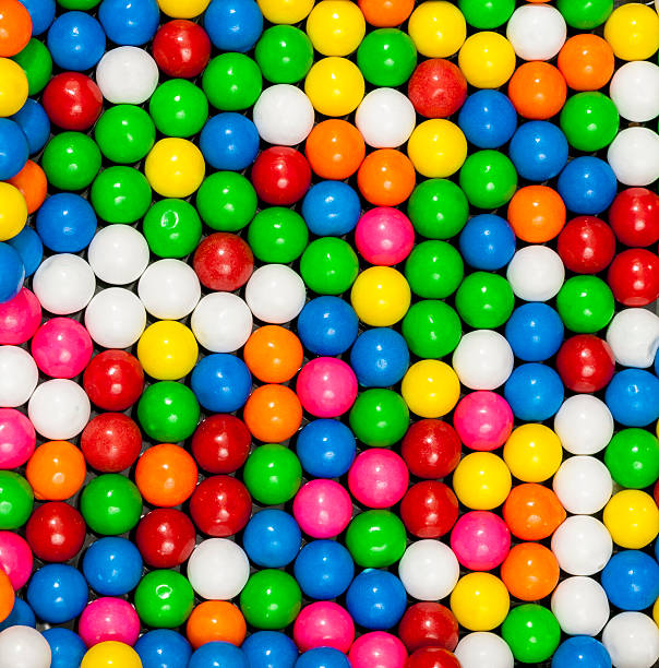 istock Colorful gumballs arranged in a patter 166514931