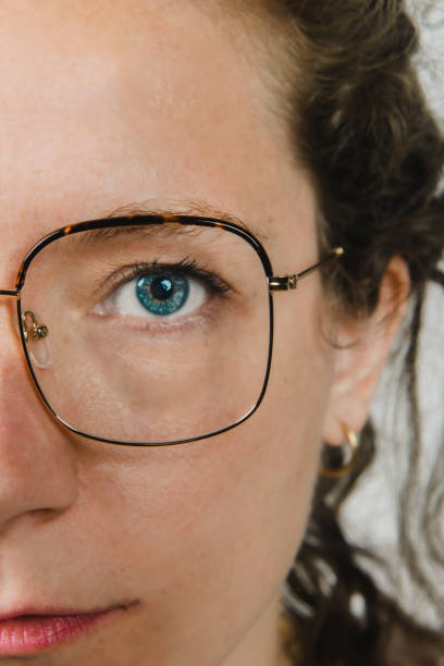istock woman blue eyes glasses 1665158685