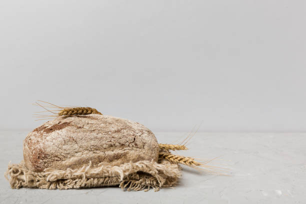 istock Homemade natural breads. Different kinds of fresh bread as background, perspective view with copy space 1665180340