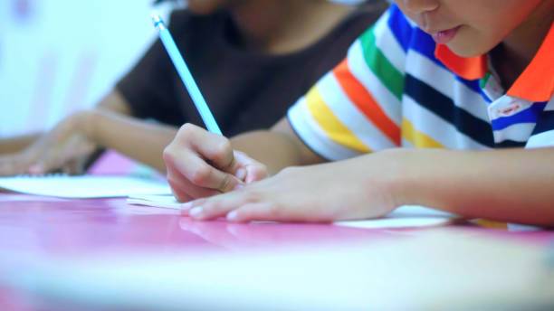 istock Asian Kids in Creative  coloring book Art workshop at school. 1665186827