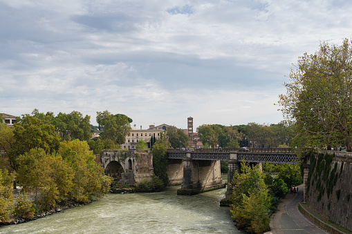 Broken bridge, Palatine Bridge and Tiber River in Rome, Italy