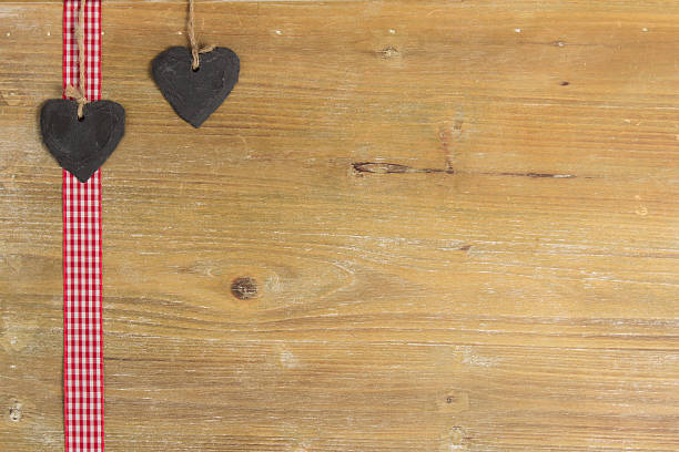 istock Heart of slate on a wood panel. 166522645