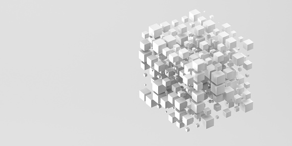 Abstract 3D background. Fractured 3D cube render against light grey background with shallow depth of field and copy space