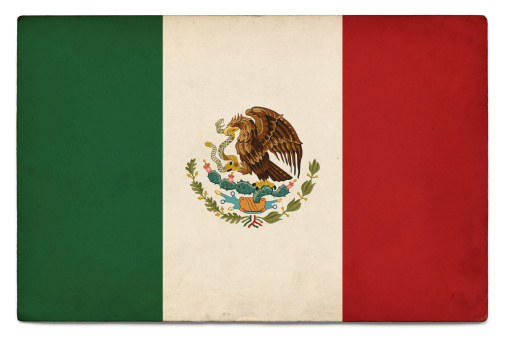 Flag of Mexico layered on grungy, postcard-sized old paper with added vintage effects. Accurate clipping path provided so the image can be placed on a different background, with or without shadow.