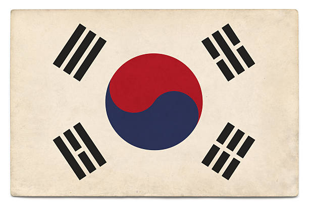 South Korean flag layered on grungy, postcard-sized old paper with added vintage effects. Accurate clipping path provided so the image can be placed on a different background, with or without shadow.